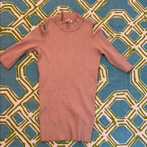 Short sleeved peach sweater with cutouts
